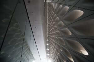 A view of a building with a lot of holes in it.