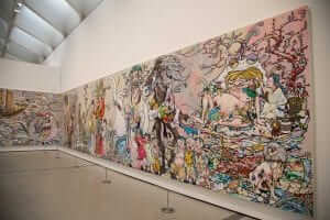 A large painting on a wall in a museum.