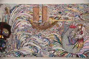 A painting of a mermaid with a skull on it.