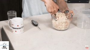 Pat mixing komekoji and brown rice