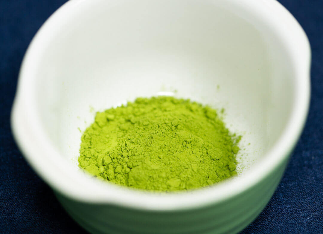 Matcha powder in white cup
