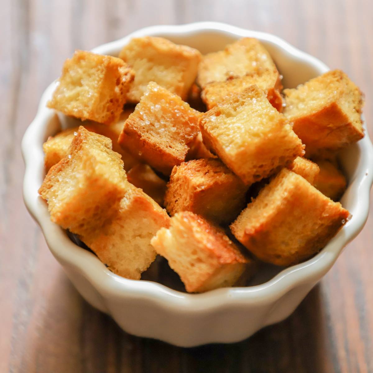 Bowl of golden brown air fryer tofu