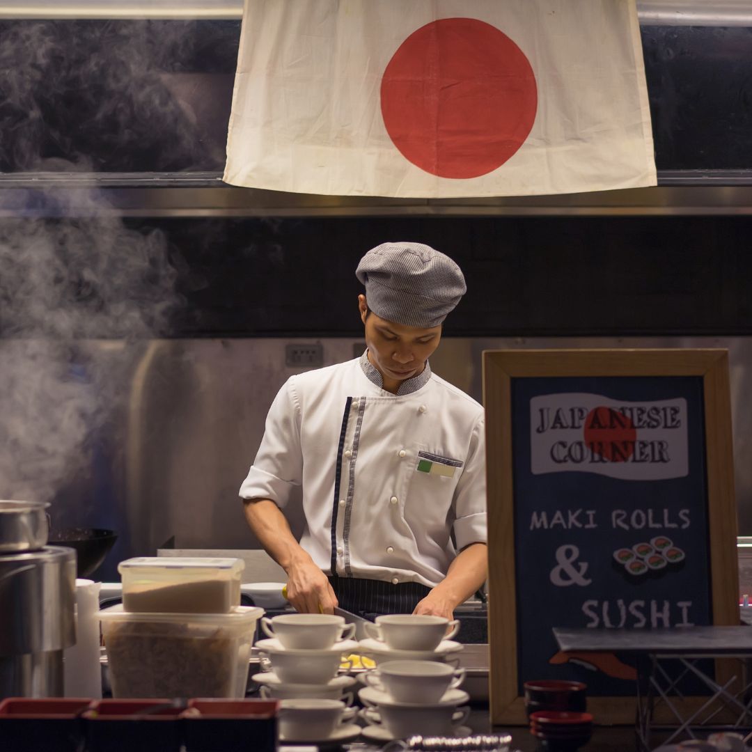 A chef cooks at a Japanese restaurant