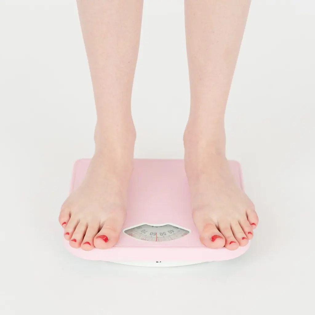 Person on a weighing scale