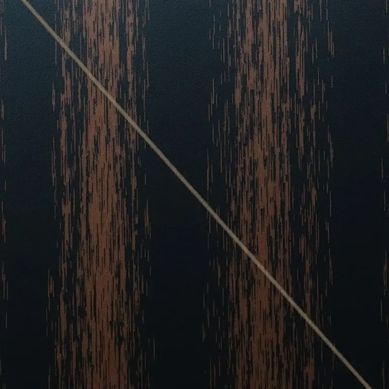 Kalonji seeds and black sesame seeds side by side on wooden board