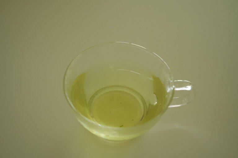 Japanese green tea brewed in a glass cup